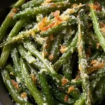Crispy garlic parmesan roasted green beans on a serving platter